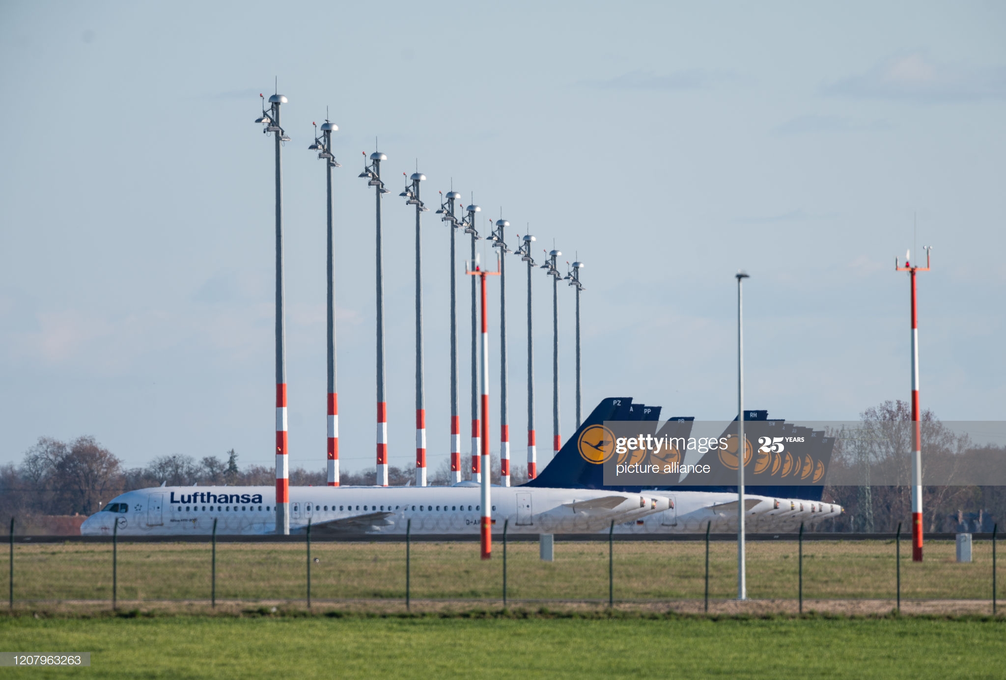 march-2020-berlin-lufthansa-aircraft-are-parked-on-the-apron-of-picture-id1207963263