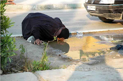 iran_poverty_woman_Khoramshahr.jpg