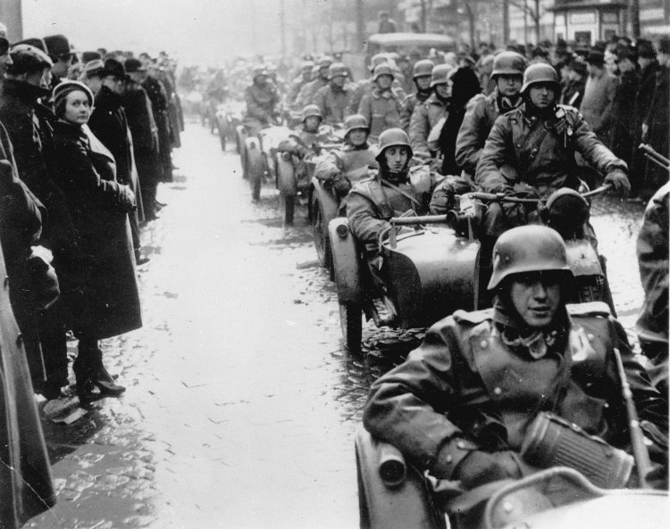 Czechs%2Bwatch%2Bas%2BGerman%2Binfantrymen%2Briding%2Bin%2Ba%2Bconvoy%2Binvade%2BPrague%2Bon%2BMarch%2B15,%2B1939.jpg