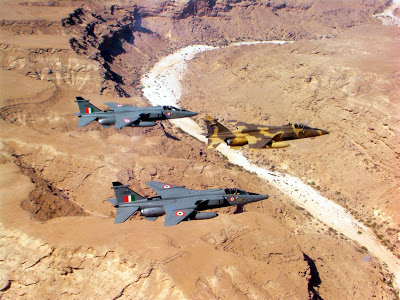 Photo-15_-_A_RAFO_Jaguar_leads_a_pair_of_IAF_Jaguars_over_Om8-712110.jpg