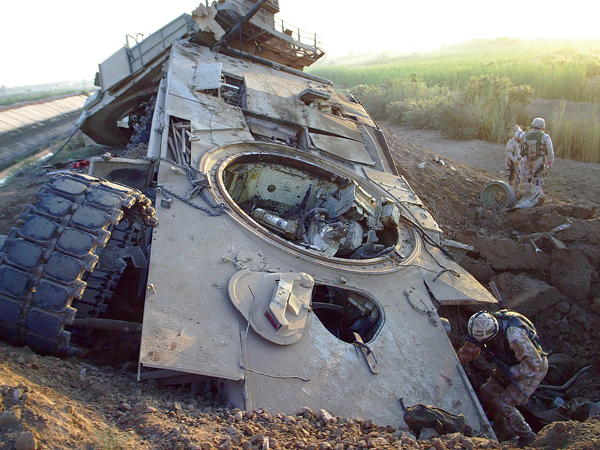 American+tank+devastated+by+an+IED+in+Afghanistan.jpg