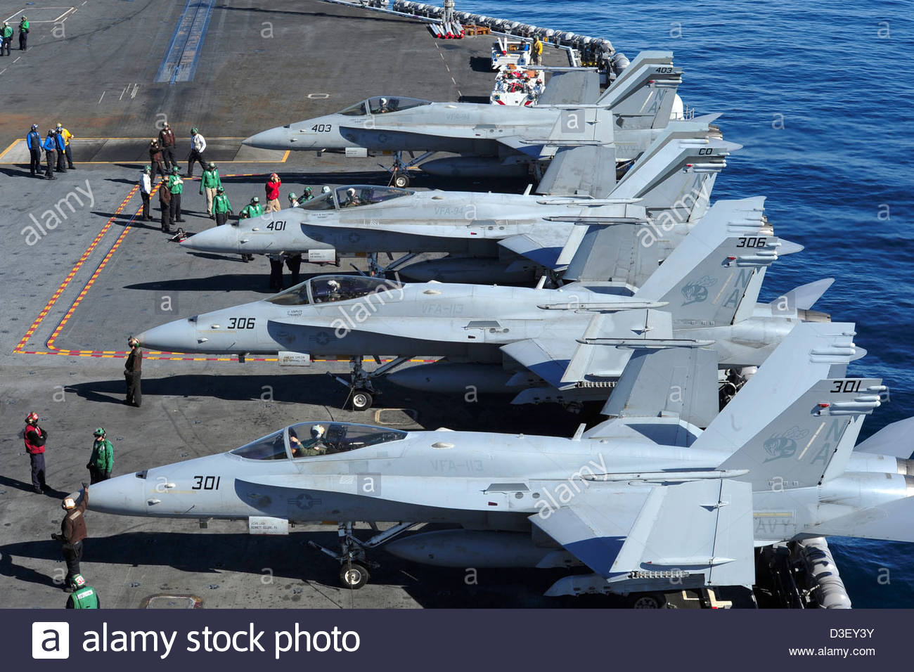 us-navy-fa-18c-hornets-line-up-before-take-off-from-the-us-navy-nimitz-D3EY3Y.jpg