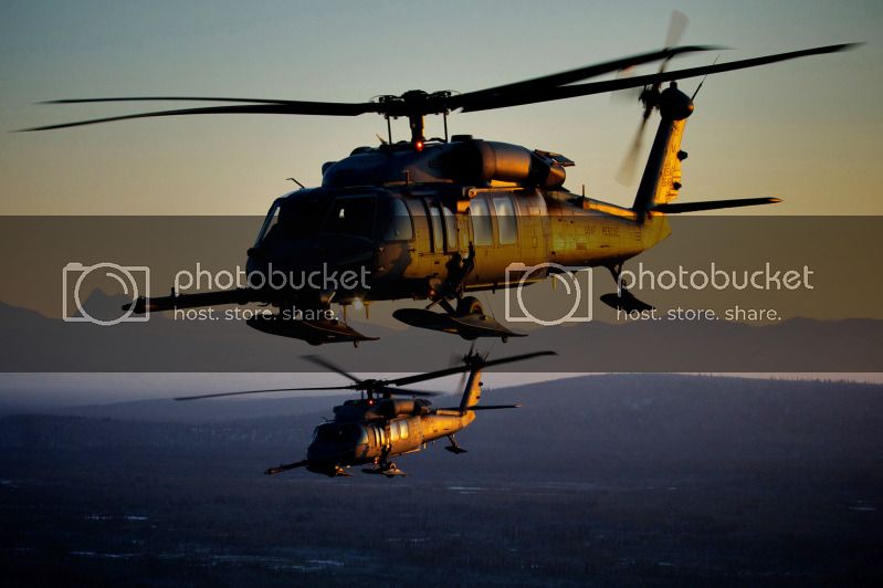TwoUSAirForceHH-60PaveHawkrecoveryhelicoptersflyoverAlaska.jpg