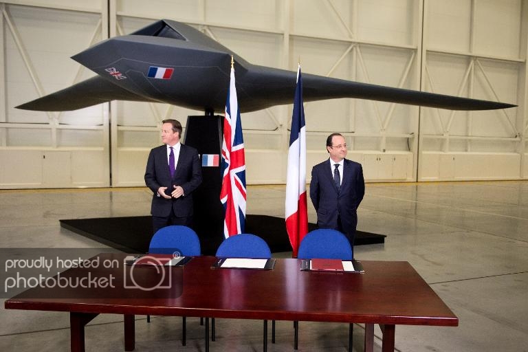 francois-hollande-et-david-cameron-ont-signe-des-accords-de_1004983_zpsbc3c5961.jpg