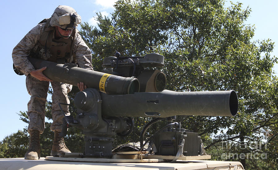 a-missileman-loads-a-tow-missile-stocktrek-images.jpg