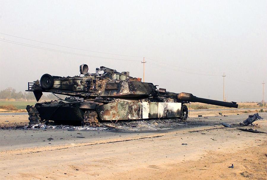 a-scuttled-abrams-tank-rests-in-front-everett.jpg