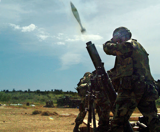 Soldiers%252520from%252520the%252520113th%252520Infantry%252520Regiment%252520fire%252520a%252520mortar%252520at%252520the%252520Hicacal%252520Range%252520during%252520training%252520in%252520Guantanamo%252520Bay%25252C%252520Cuba..jpg