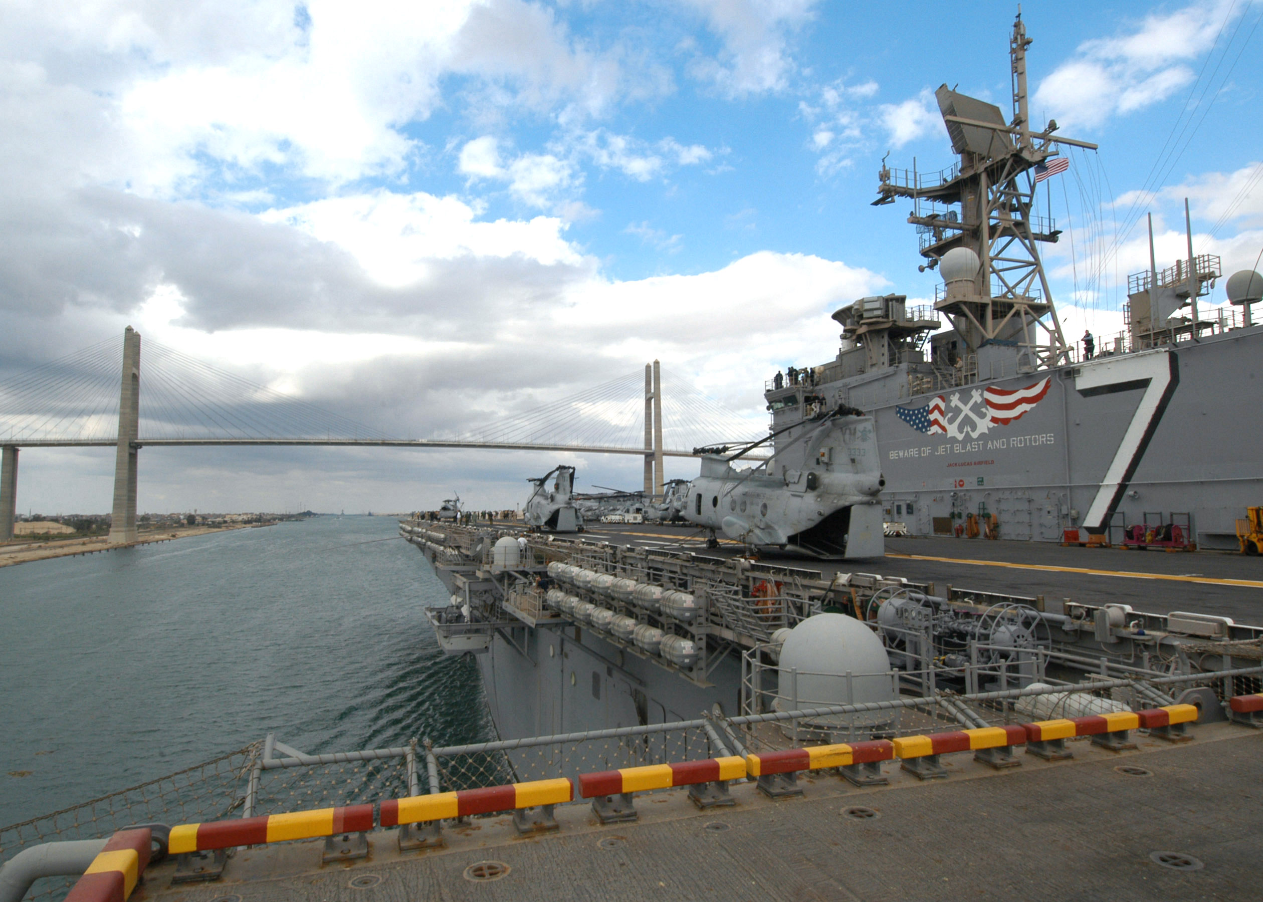 US_Navy_061108-N-6282K-001_The_amphibious_assault_ship_USS_Iwo_Jima_%28LHD_7%29_prepares_to_pass_under_the_Mubarak_Peace_Bridge_while_transiting_through_the_Suez_Canal.jpg