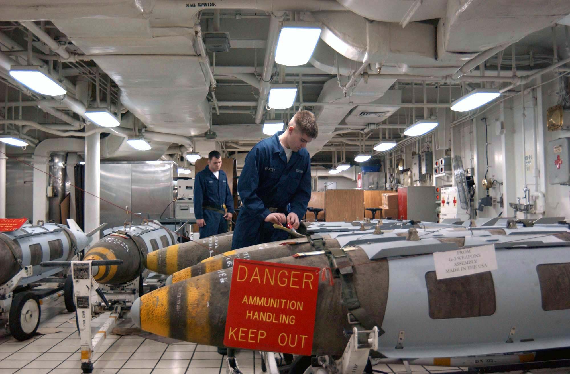 US_Navy_030320-N-5292M-001_Aviation_Ordnancemen_inspect_a_Joint_Direct_Attack_Munition_(JDAM)_GBU-31_in_preparation_for_loading_on_air_wing_aircraft.jpg