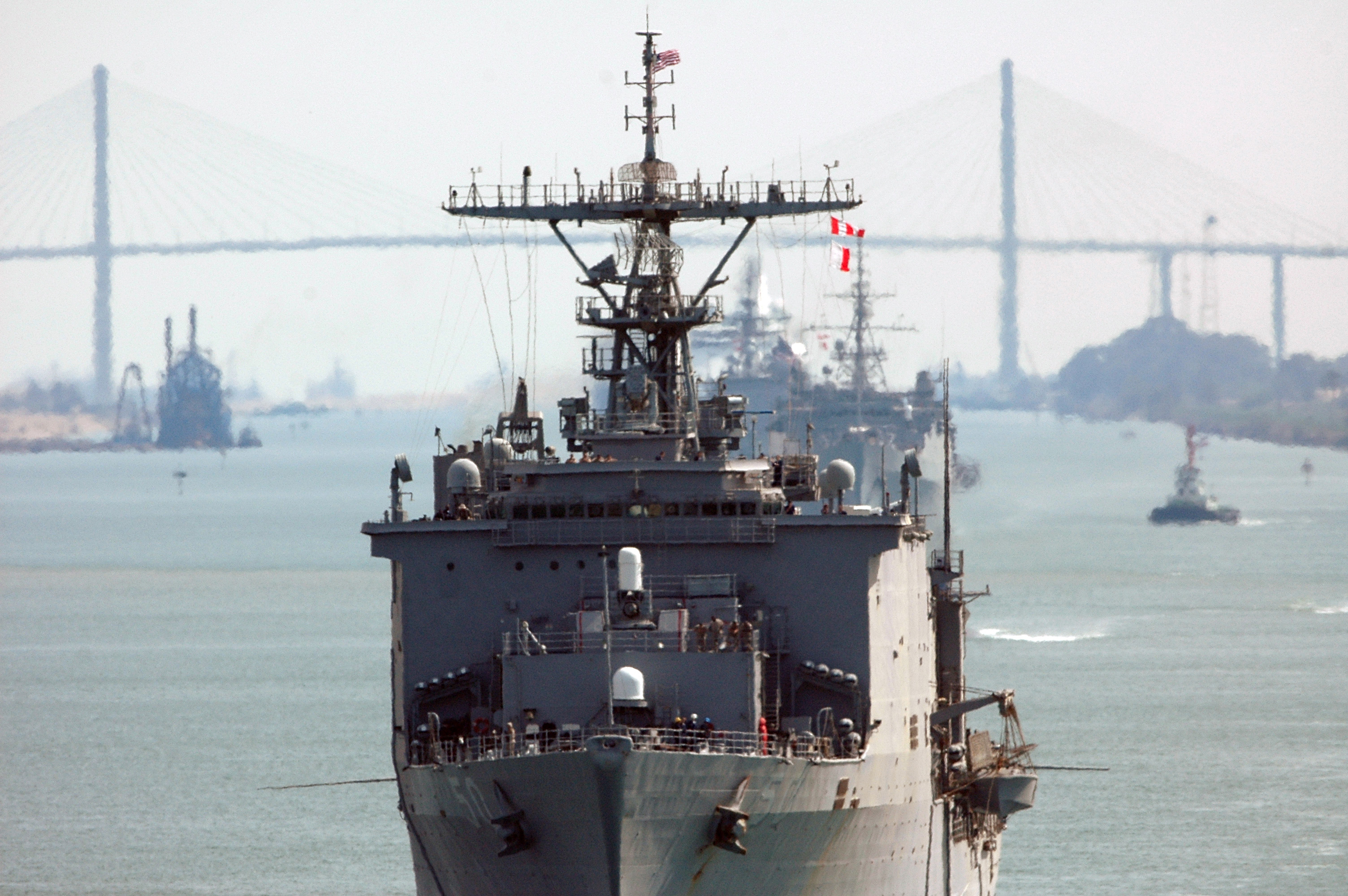 US_Navy_060409-N-1429S-001_The_dock_landing_ship_USS_Carter_Hall_%28LSD_50%29_trails_the_amphibious_assault_ship_USS_Nassau_%28LHA_4%29_as_she_transits_the_Suez_Canal.jpg