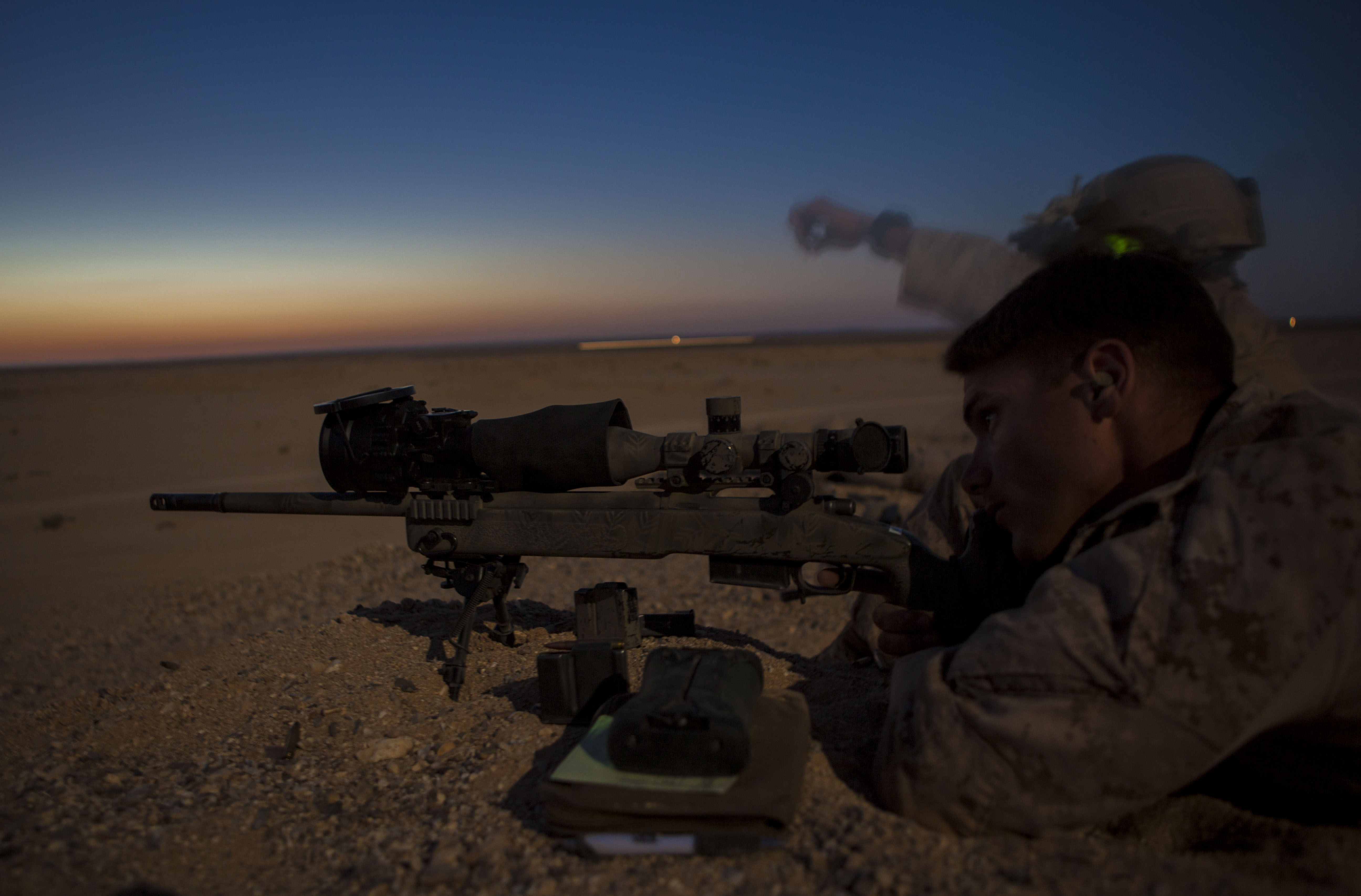 A_U.S._Marine_with_the_26th_Marine_Expeditionary_Unit_(MEU)_Maritime_Raid_Force_fires_an_M40_sniper_rifle_during_a_nighttime_live-fire_exercise_June_21,_2013,_in_Jordan_as_part_of_exercise_Eager_Lion_2013_130621-M-SO289-005.jpg