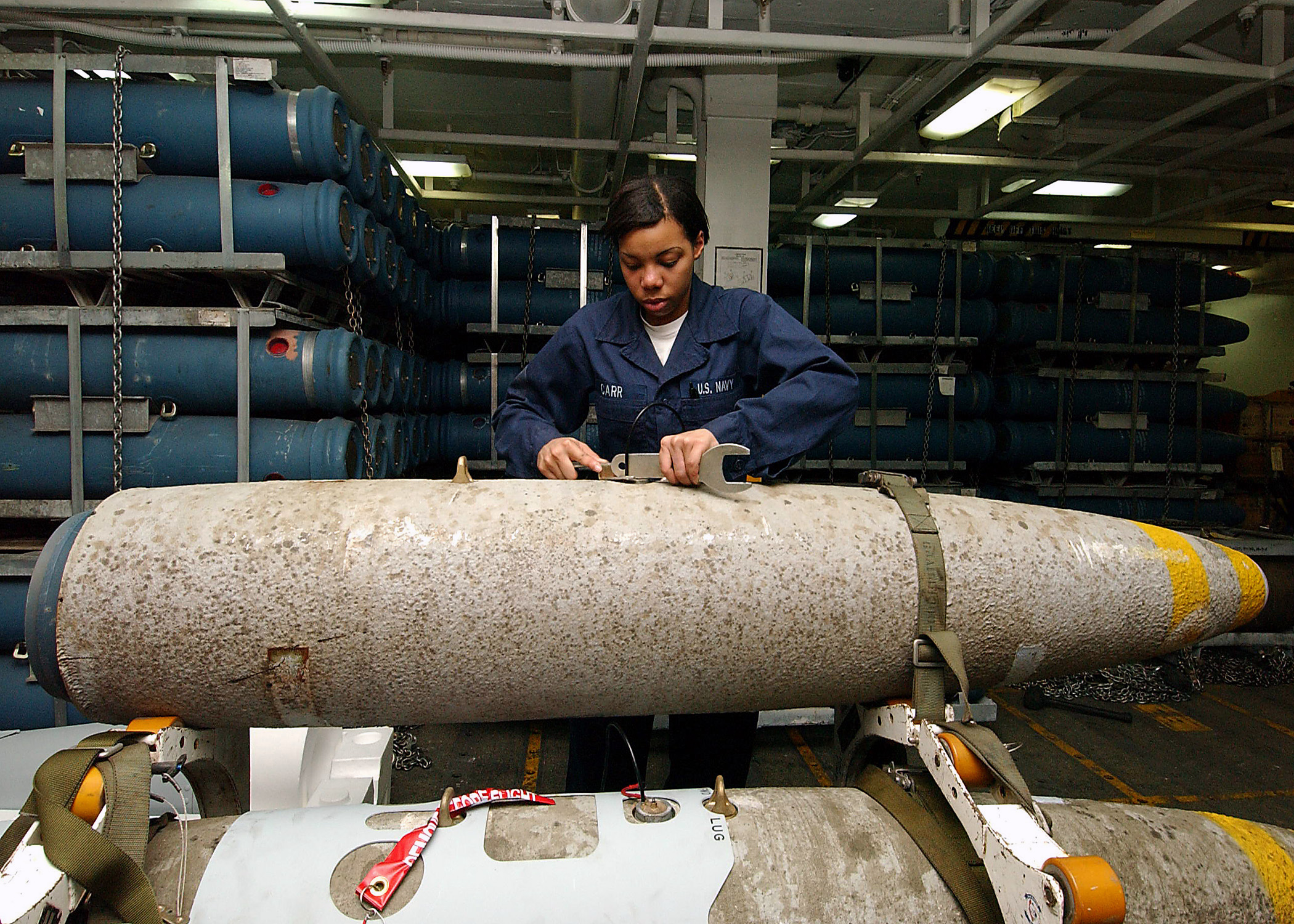 US_Navy_040429-N-1082Z-116_Aviation_Ordnanceman_Airman_Lauren_Carr,_from_Atlanta,_Ga.,_puts_a_switch_on_a_2,000_lbs_MK-84_general-purpose_bomb.jpg