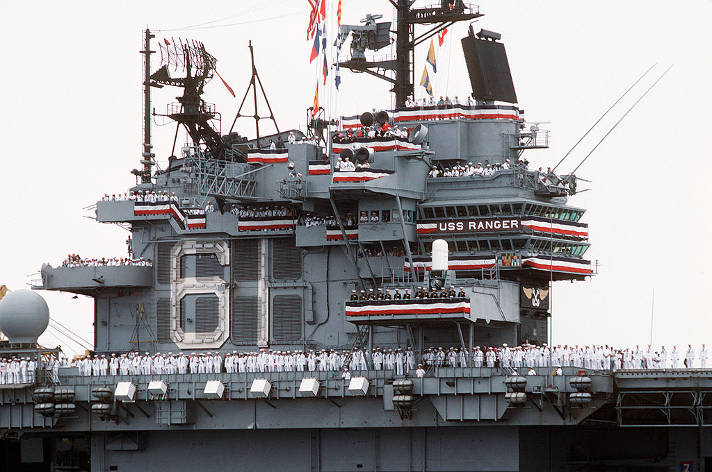 1024px-USS_Ranger_%28CV-61%29_crew_mans_the_rails_following_Desert_Storm_closeup_on_island.jpg