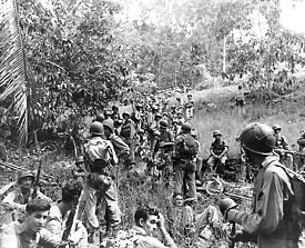 275px-Marines_rest_in_the_field_on_Guadalcanal.jpg