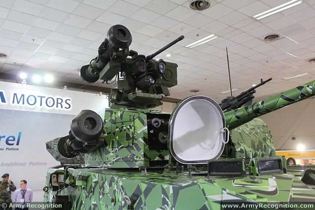PROTECTOR_MCT-30R_Kongsberg_on_TATA_Motors_Kestrel_8x8_armoured_vehicle_Defexpo_2014_India_001.jpg