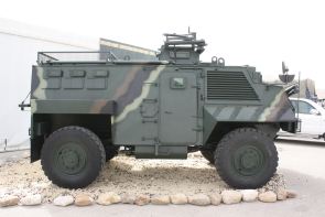 Saxon_KADDB_wheeled_armoured_vehicle_personnel_carrier_Jordan_Jordanian_army_right_side_view_001.jpg