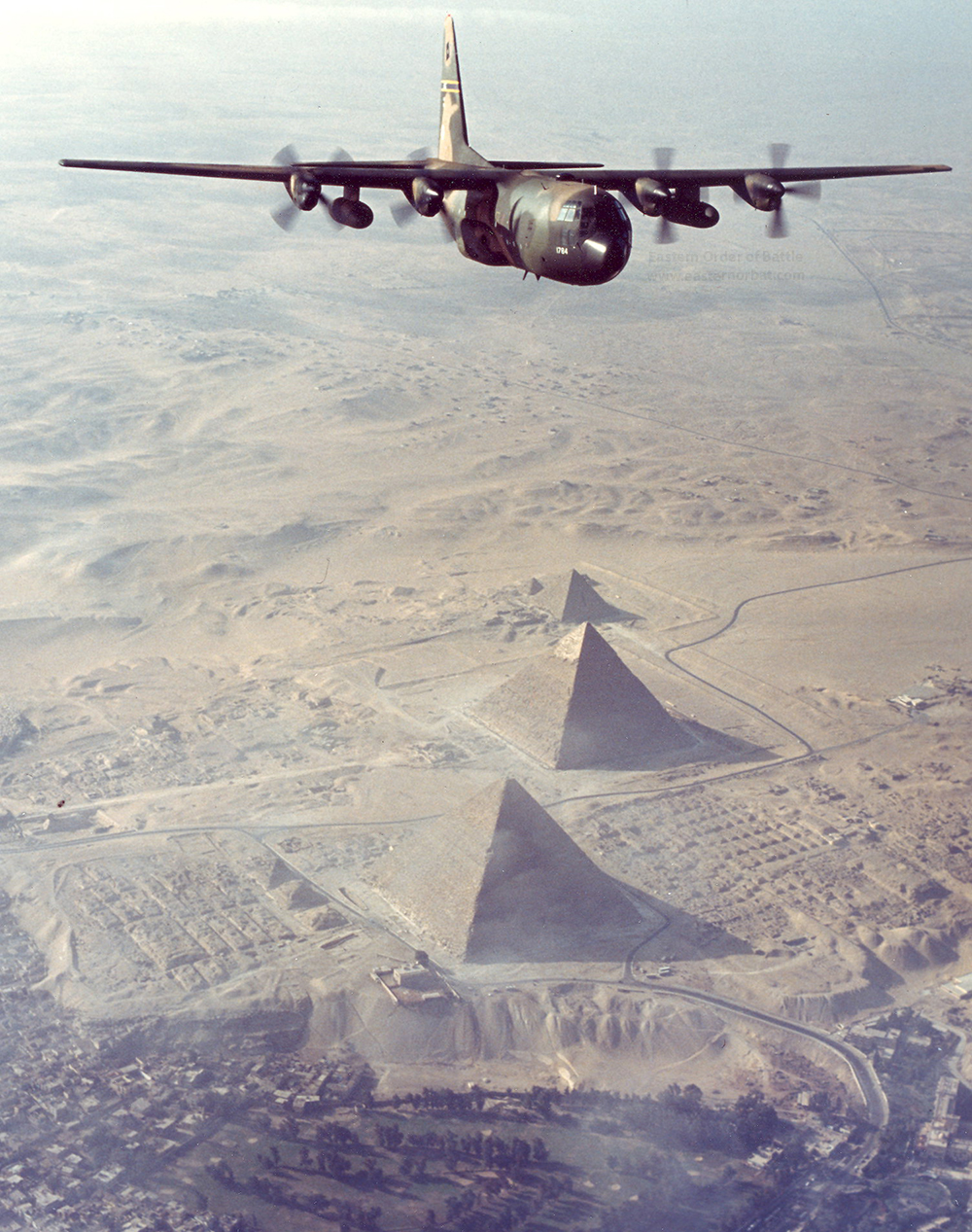 C-130E_of_the_130th_Airlift_Group_out_of_Charleston__West_Virginia_flying_over_the_famed_pyramids_of_Egypt_in_November__1981.JPG