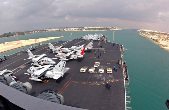 US_Navy_060215-N-0685C-009_The_Nimitz-class_aircraft_carrier_USS_Theodore_Roosevelt_CVN_71_transits_through_the_Suez_Canal._The_100-mile_Suez_Canal_connects_the_Red_Sea_and_the_Mediterranean_Sea.jpg