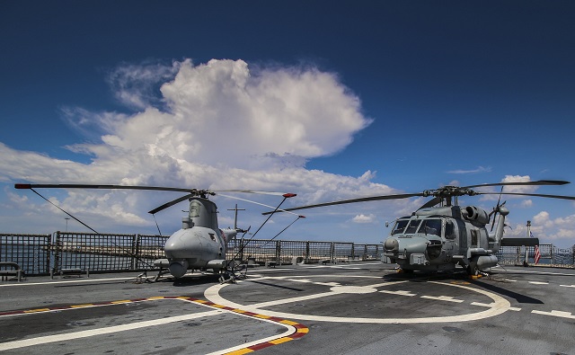 MQ-8B_Fire_Scout_UAS_Target_Designates_MH-60R_Sea_Hawk_US_Navy.JPG