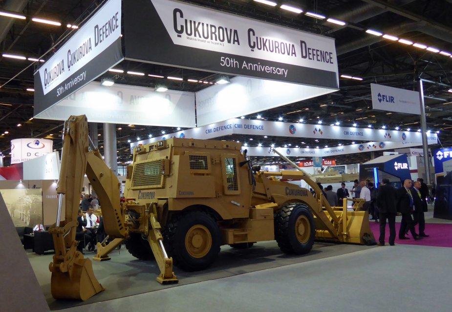 Eurosatory_2018_Turkish_company_Cukurova_Defence_displays_4x4x4_armored_backhoe_loader.jpg