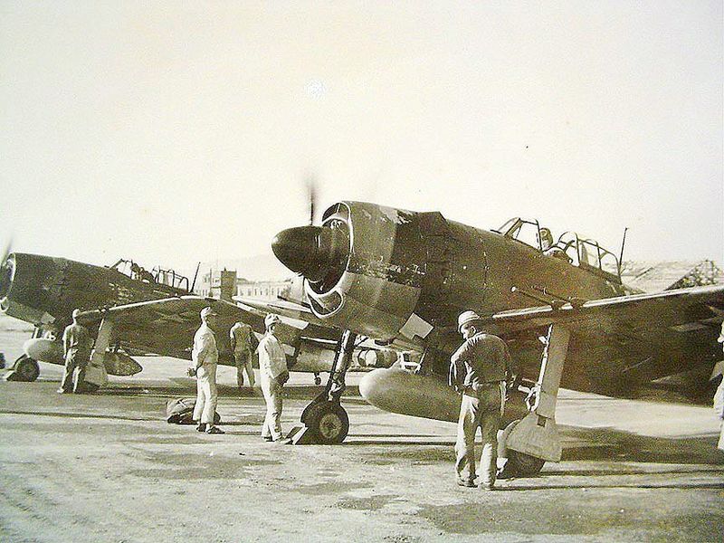 captured-kawanishi-n1k2-js-having-their-homare-engines-run-up-by-former-ijnas-groundcrew-1945.jpg