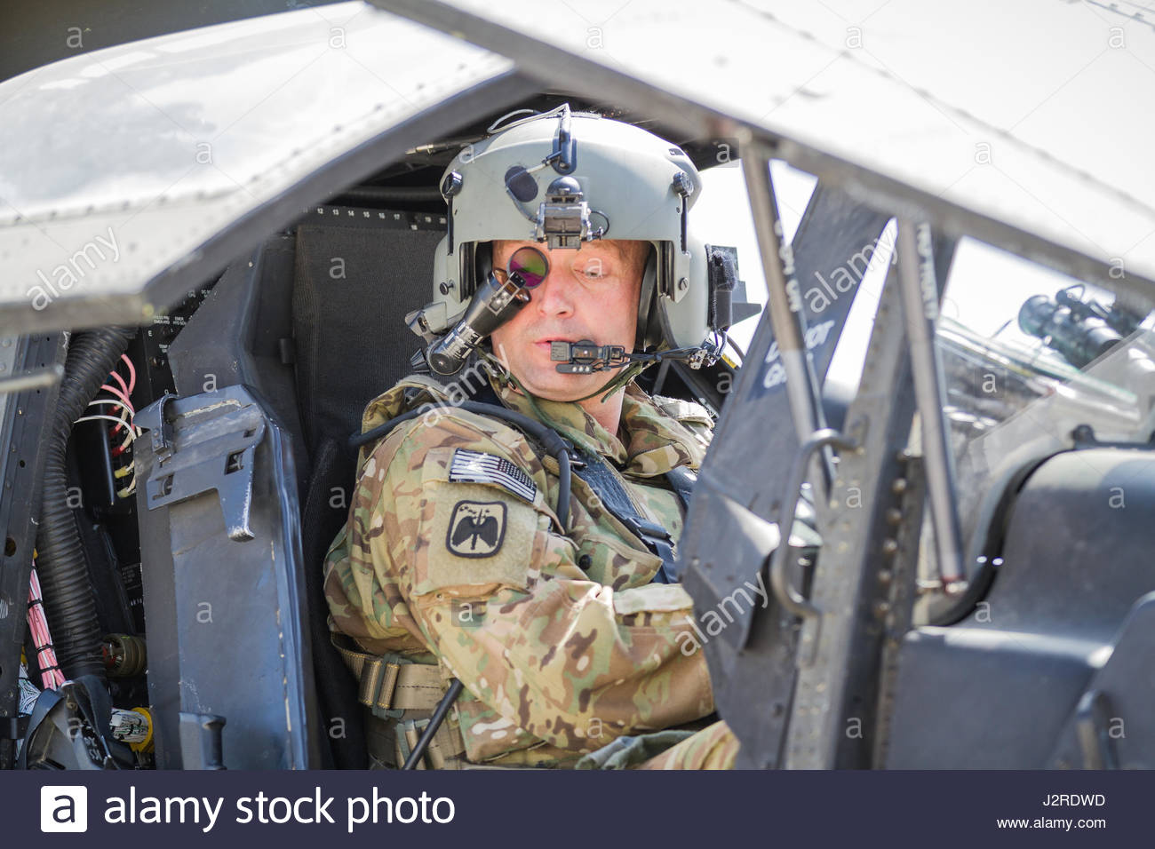 a-us-army-ah-64e-apache-helicopter-pilot-assigned-to-task-force-tigershark-J2RDWD.jpg