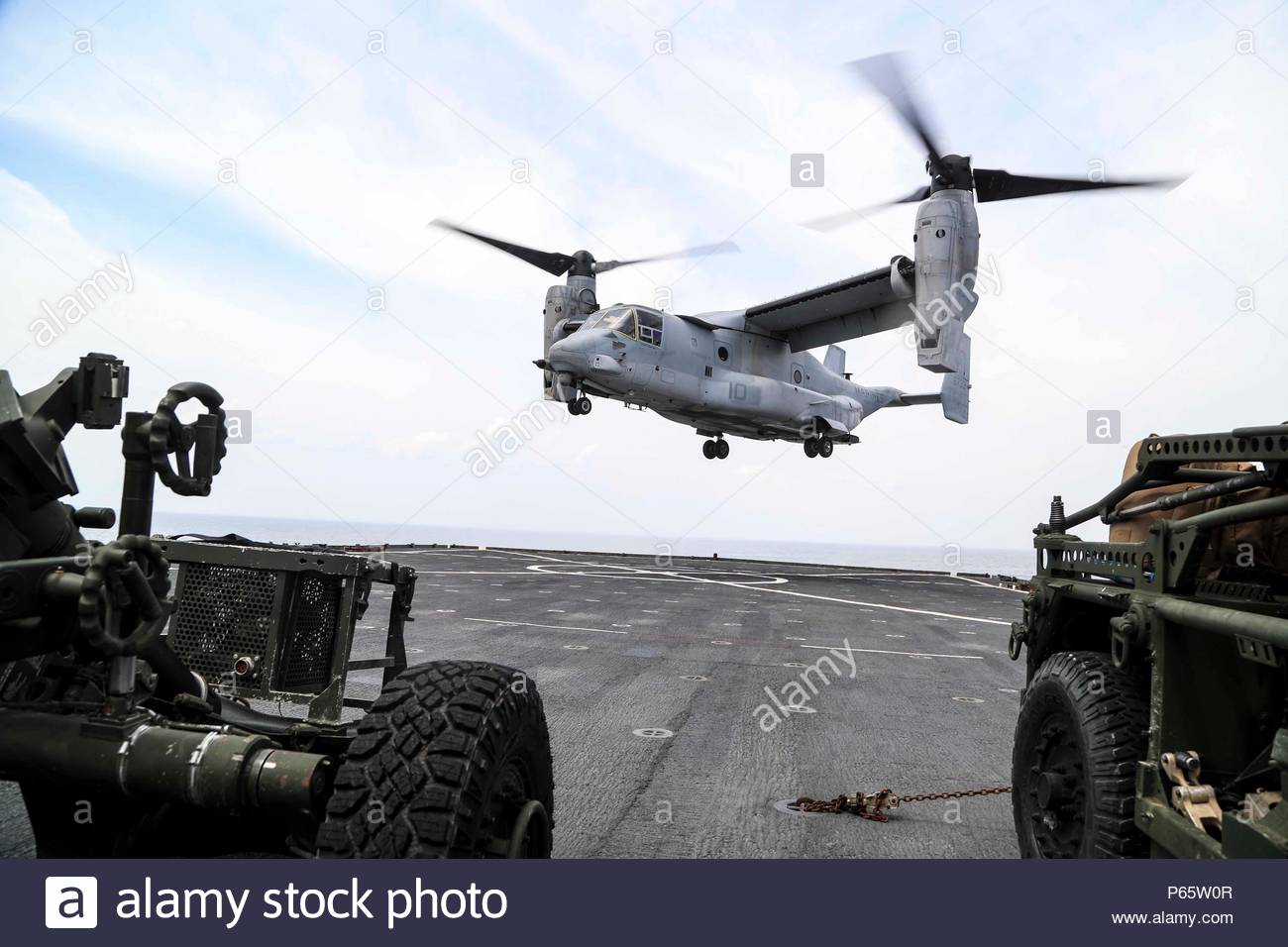 a-us-marine-corps-mv-22-osprey-lands-on-the-uss-whidbey-island-lsd-41-may-5-2016-the-vehicles-were-loaded-to-support-a-theater-security-cooperation-event-as-a-part-of-a-meu-readiness-exercise-us-marine-corps-photo-by-lance-cpl-koby-i-saunders22-marine-expeditionary-unit-released-P65W0R.jpg