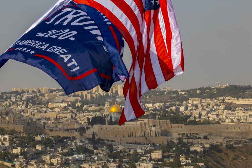 Israeli supporters of Donald Trumps wave US and Israeli flags to support his candidacy for the presidential in Jerusalem on October 27, 2020
