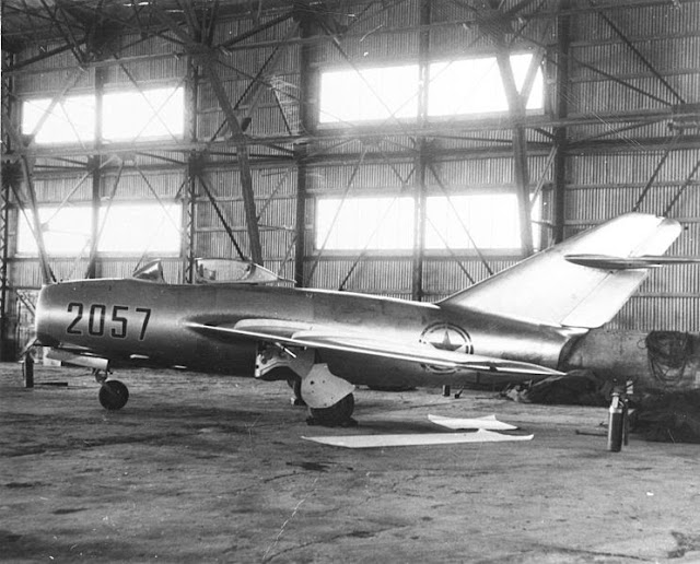 743px-Mi-G-15bis-in-hangar-at-Kimpo-AB-21-Sept-1953.jpg