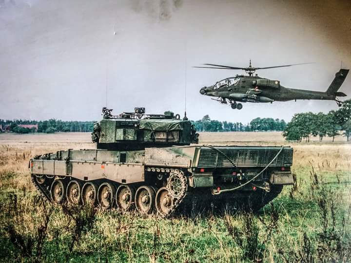 r/TankPorn - A Strv 121 (swedish leopard) and an Apache being tested by Sweden