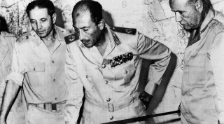 Egypt's Chief-of-Staff Saad el-Shazly (left), President Anwar Sadat (center) and Minister of War Ismail Ali review battlefield developments in 1973. Egypt's Chief-of-Staff Saad el-Shazly (left), President Anwar Sadat (center) and Minister of War Ismail Ali review battlefield developments in 1973.