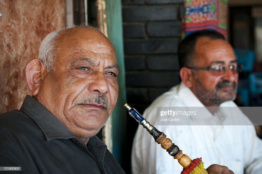 arab-men-and-hookah-in-port-said-egypt-picture-id131900905