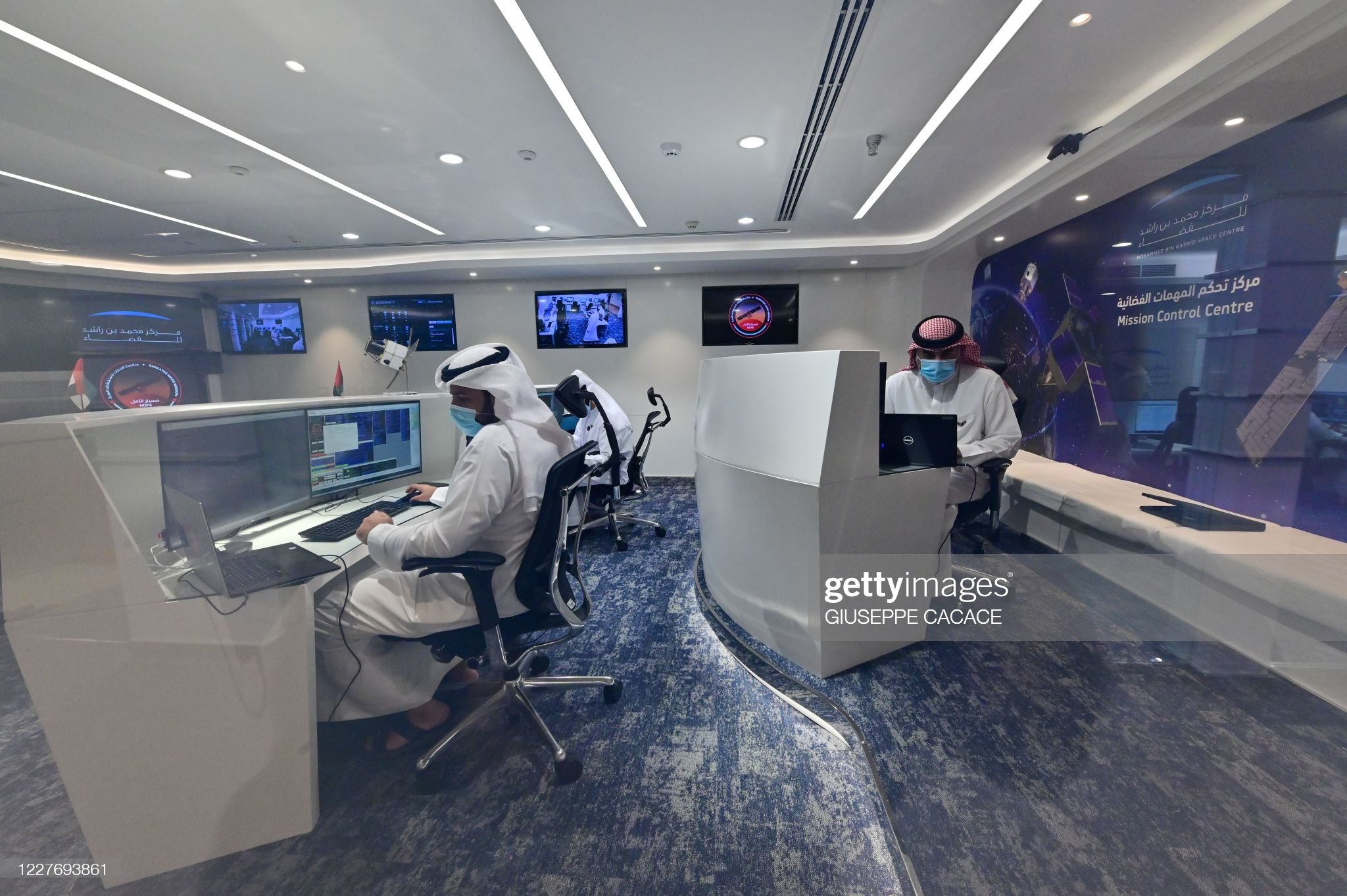 emirati-men-are-pictured-at-the-mission-control-center-for-the-hope-picture-id1227693861