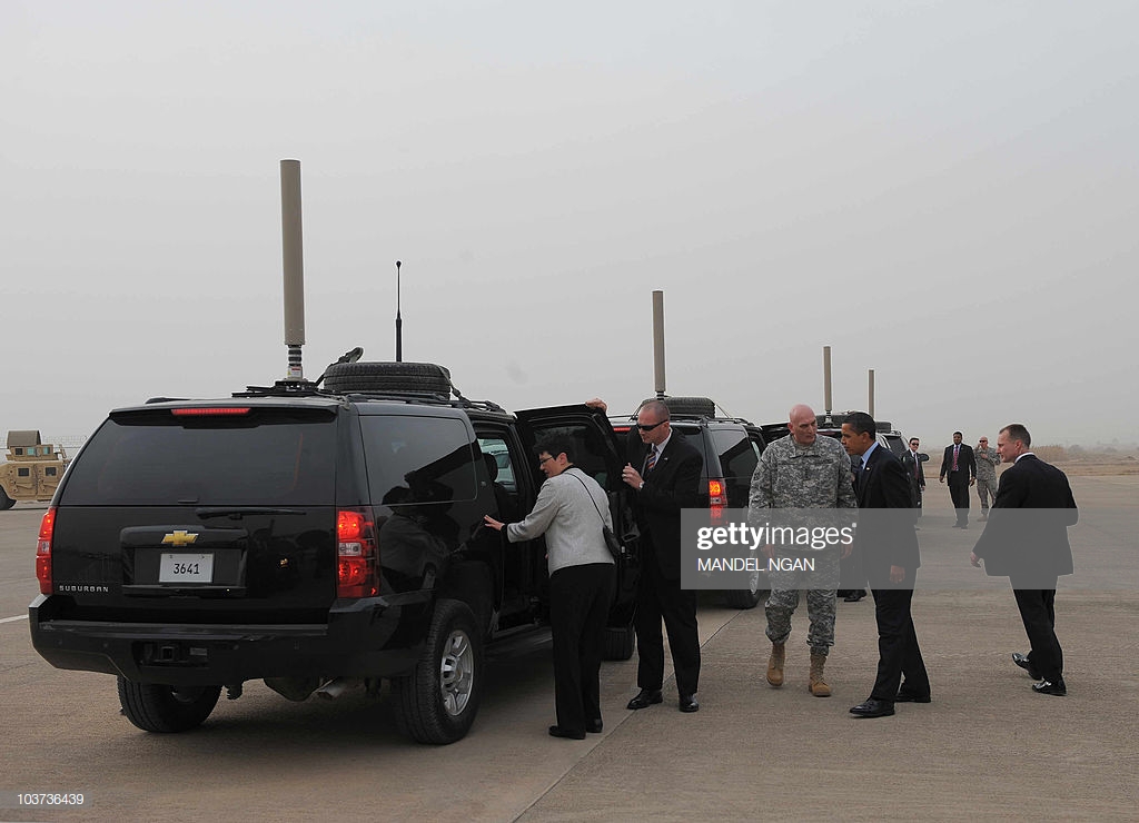 president-barack-obama-makes-his-way-to-board-a-motorcade-upon-at-picture-id103736439