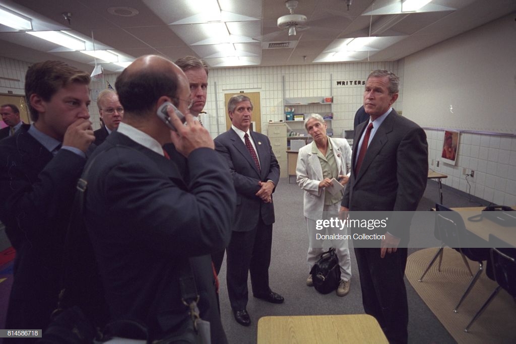 president-george-w-bush-confers-with-staff-members-tuesday-spet-11-at-picture-id814586718