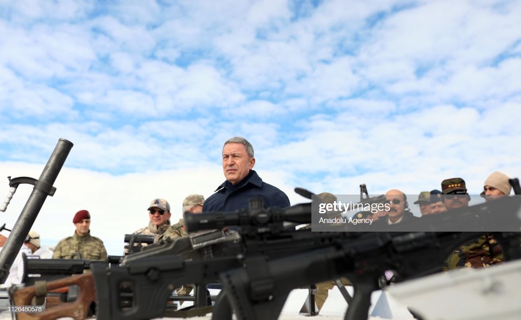 turkish-national-defense-minister-hulusi-akar-watches-the-winter-2019-picture-id1126480578