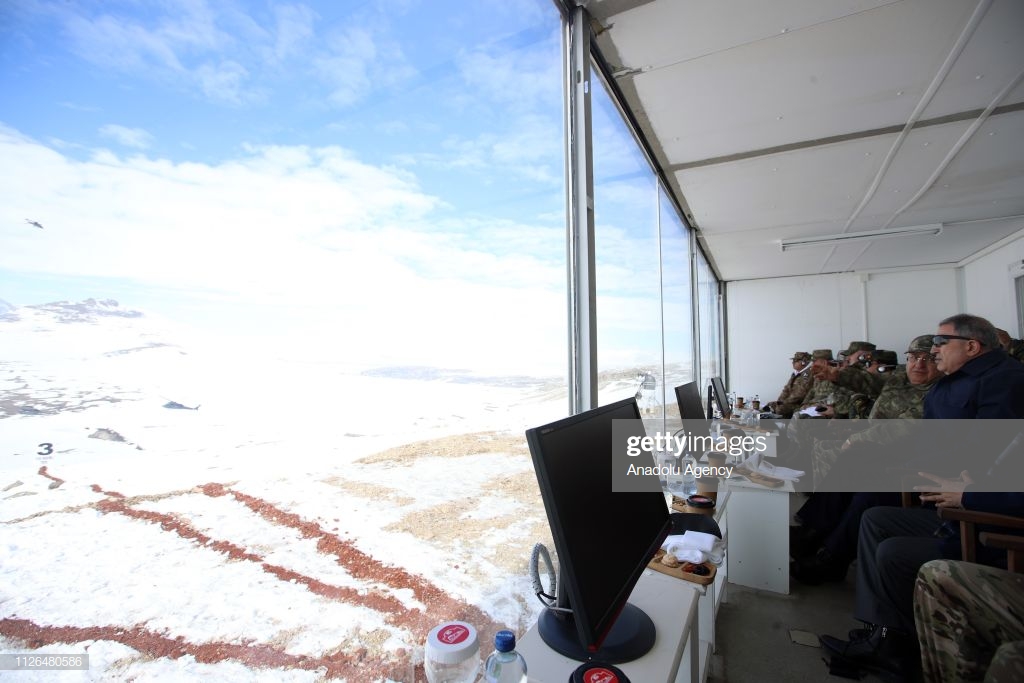 turkish-national-defense-minister-hulusi-akar-watches-the-winter-2019-picture-id1126480586