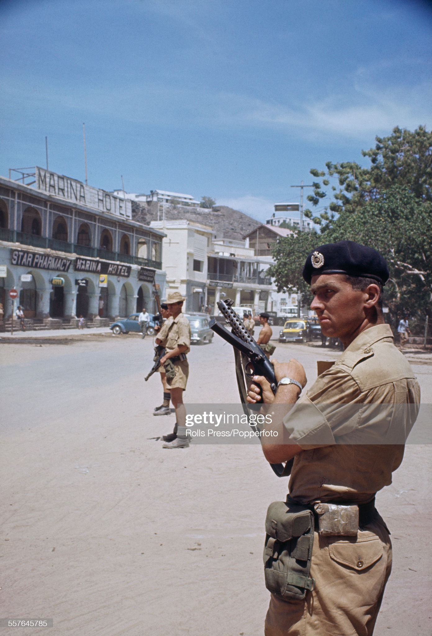 view-of-armed-british-soldiers-on-patrol-on-the-streets-of-aden-town-picture-id557645785