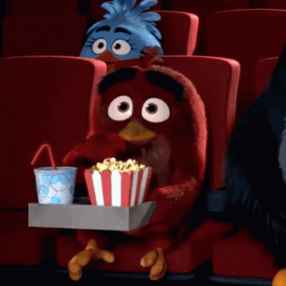 eating-popcorn-watching-a-movie.gif