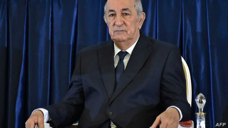 (FILES) In this file photo taken on December 19, 2019 Algerian President-elect Abdelmadjid Tebboune sits during the formal…