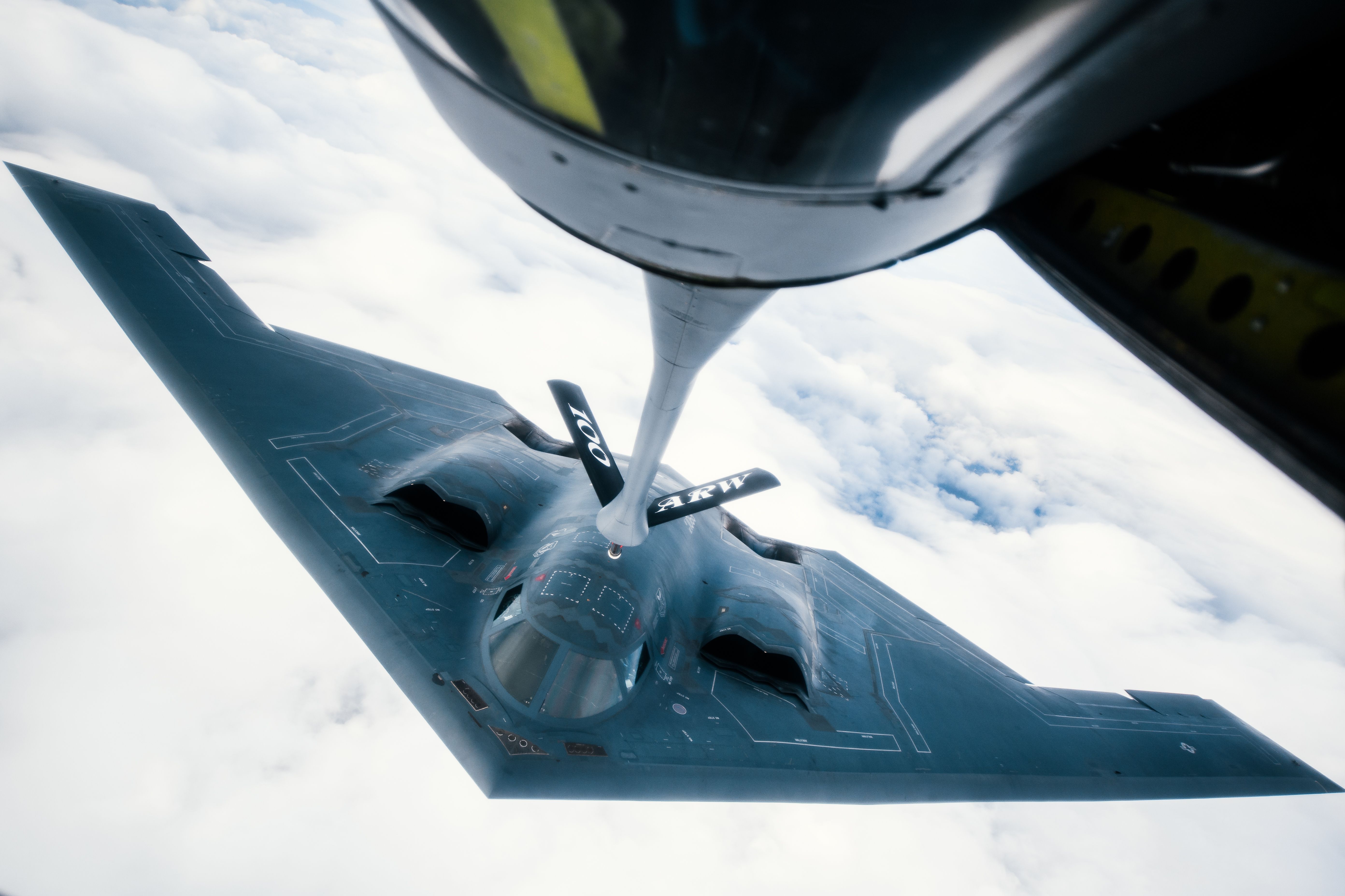 509th Bomb Wing B-2 Spirit approaches to refuel from a 351st Aerial Refueling Squadron KC-135 Stratotanker during the Bomber Task Force training exercise over England 509th Bomb Wing B-2 Spirit approaches to refuel from a 351st Aerial Refueling Squadron KC-135 Stratotanker during the Bomber Task Force training exercise over England
