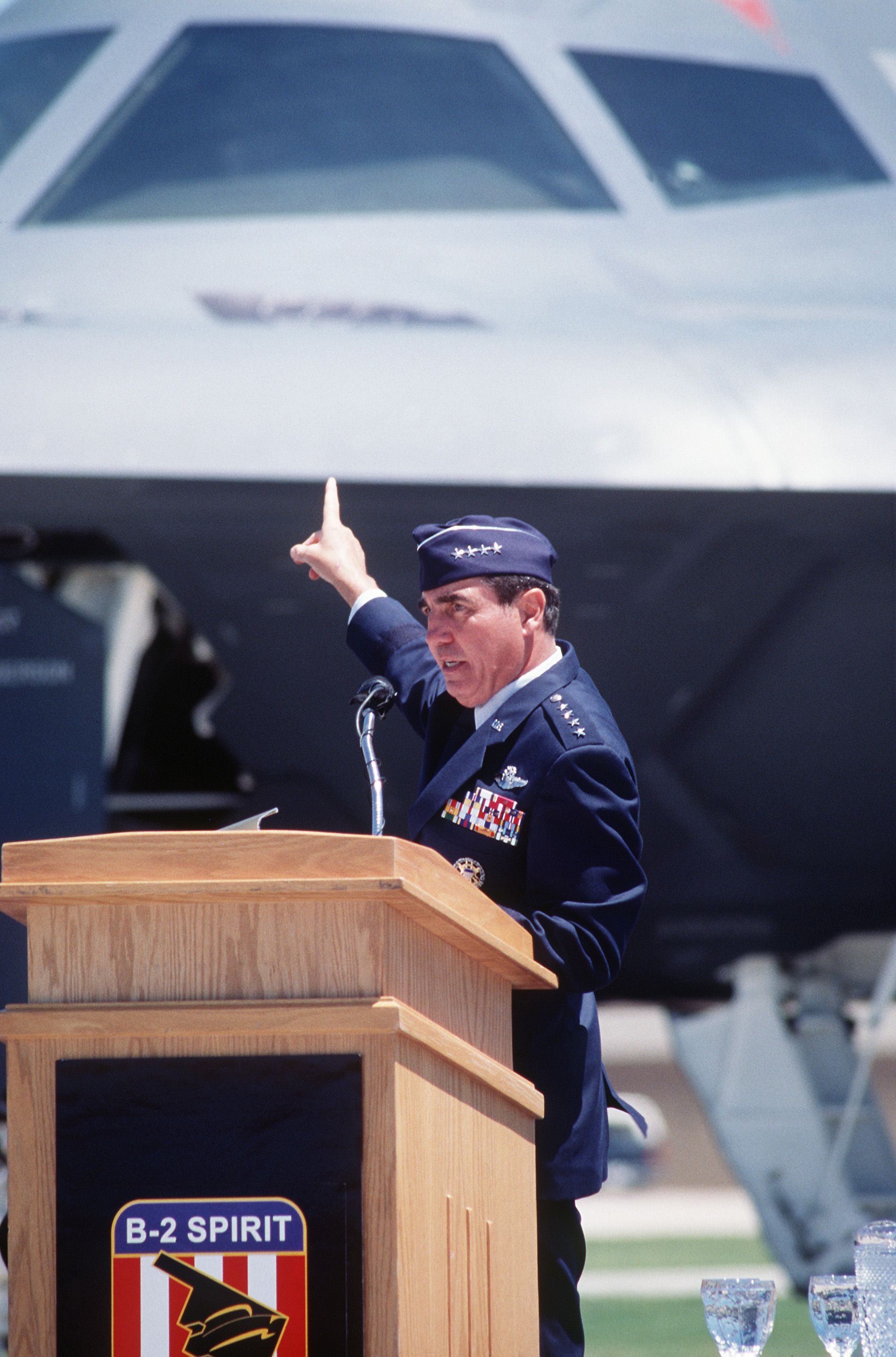 General John Loh, Commander and CHIEF Air Combat Command addresses civilian and military personnel during the 'Spirit of Kansas' B-2 naming ceremony in 1995 General John Loh, Commander and CHIEF Air Combat Command addresses civilian and military personnel during the 'Spirit of Kansas' B-2 naming ceremony in 1995