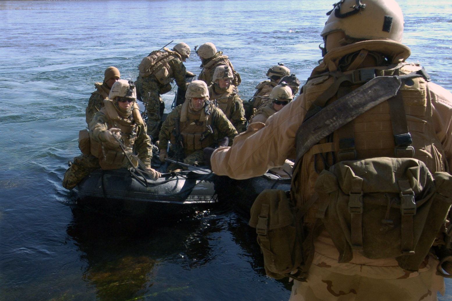 US_Navy_080106-N-8135W-240_Sailors_attached_to_Riverine_Squadron_(RIVRON)_2_Detachment_3_come_ashore_after_searching_islands_on_the_Euphrates_River_for_weapons_caches.jpg