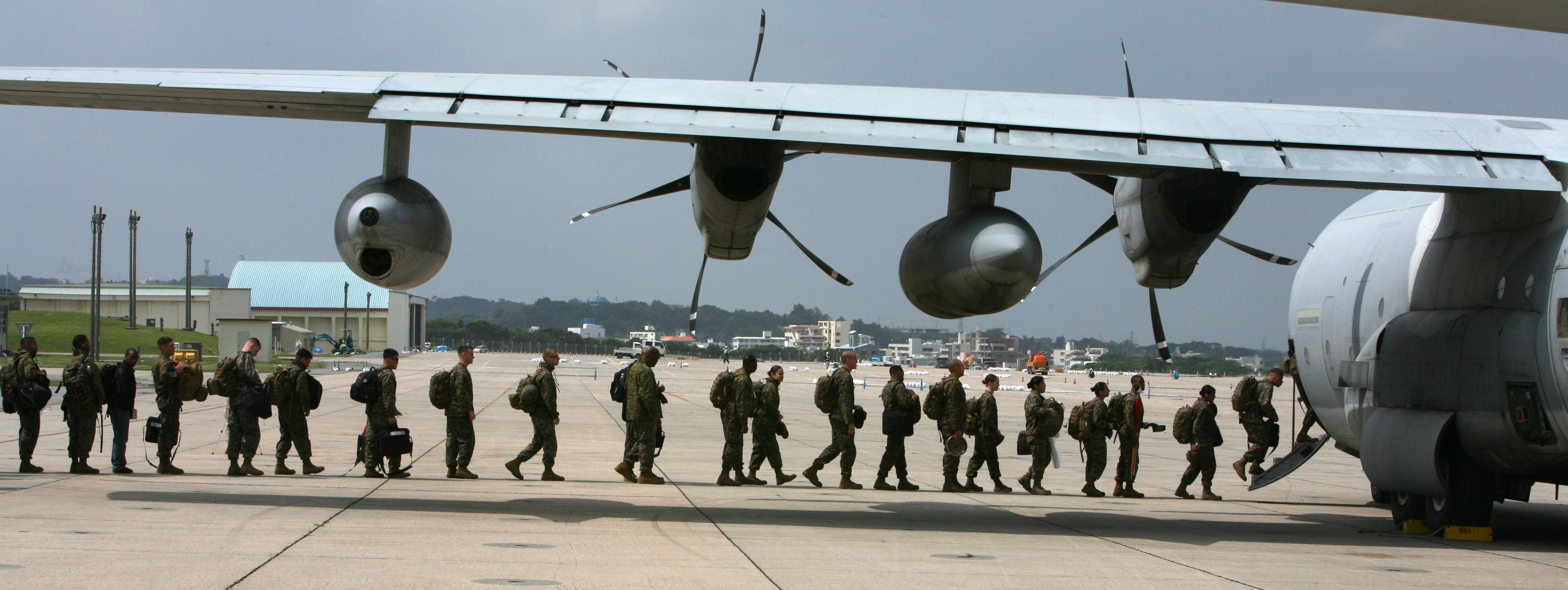 US_Navy_110316-M-VD776-008_Marines_board_a_KC-130J_Super_Hercules_aircraft_to_provide_assistance_to_areas_in_Japan.jpg