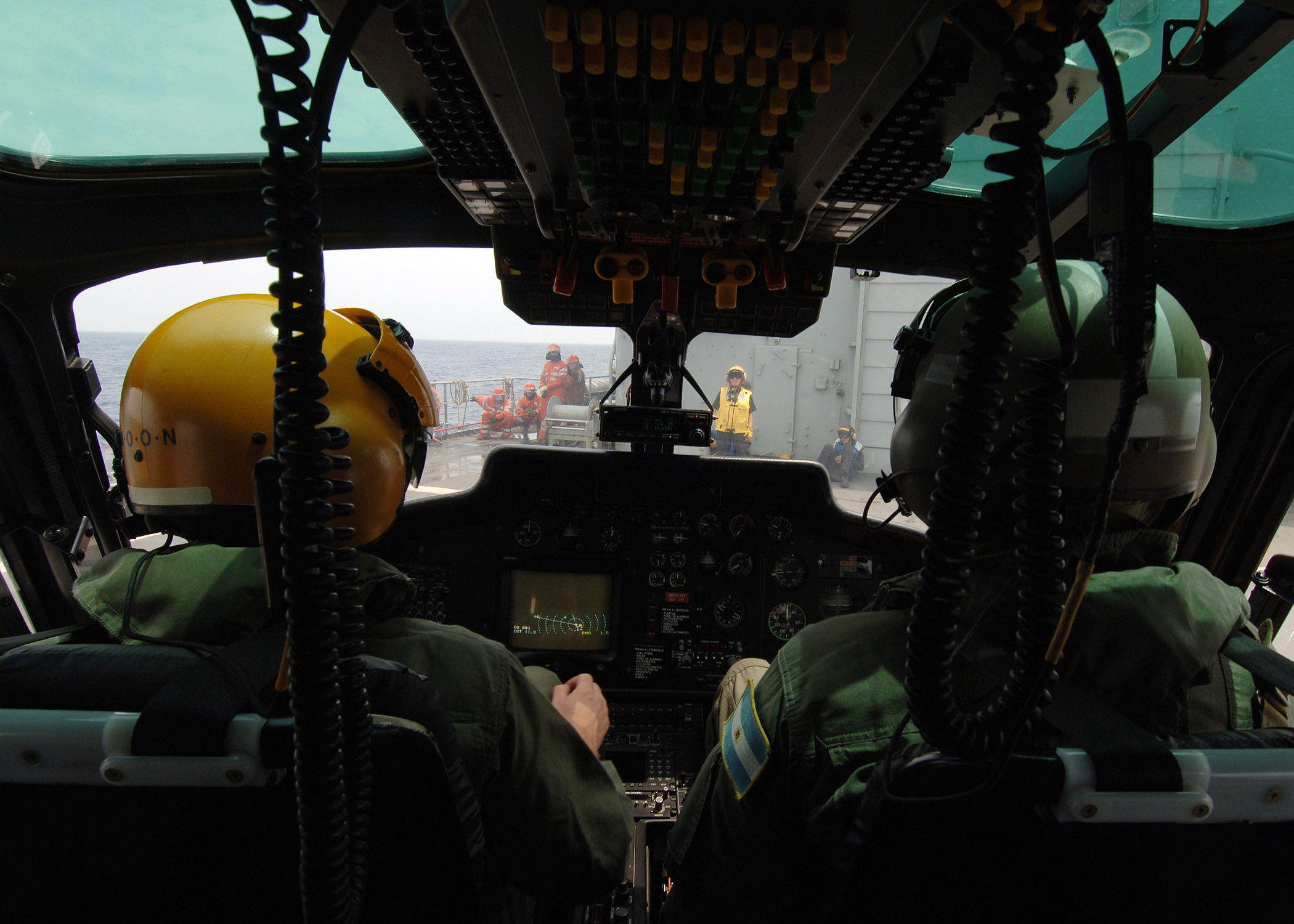 US_Navy_051023-N-4374S-001_Pilots_of_an_Argentinean_AS_555_Fennec_helicopter_make_final_preparations_prior_to_launch_from_the_flight_deck_of_the_Spanish_oilier_SPS_Marques_De_Le_Ensenada_%28A_11%29.jpg