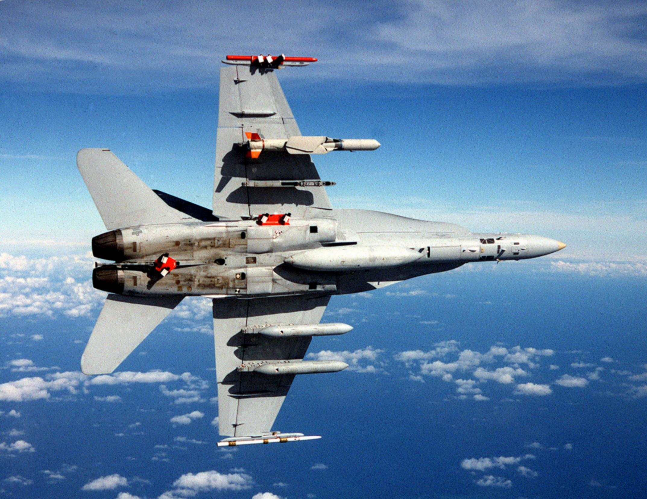 F-18C_with_SLAM-ER_missile_and_AWW-13_pods_in_flight.jpg