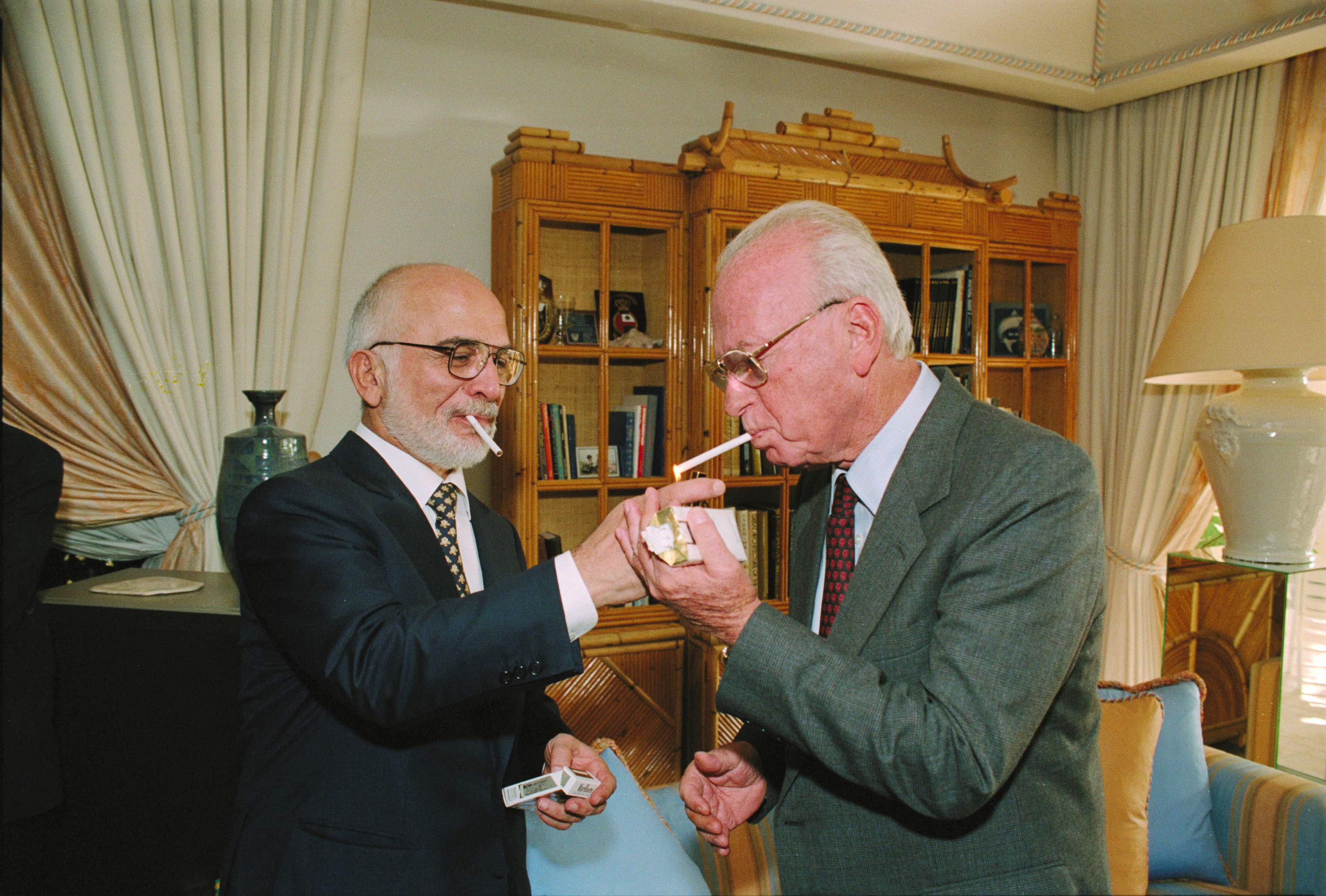Flickr_-_Government_Press_Office_%28GPO%29_-_King_Hussein_of_Jordan_lights_P.M.Yitzhak_Rabin%27s_cigarette_at_royal_residence_in_Akaba.jpg