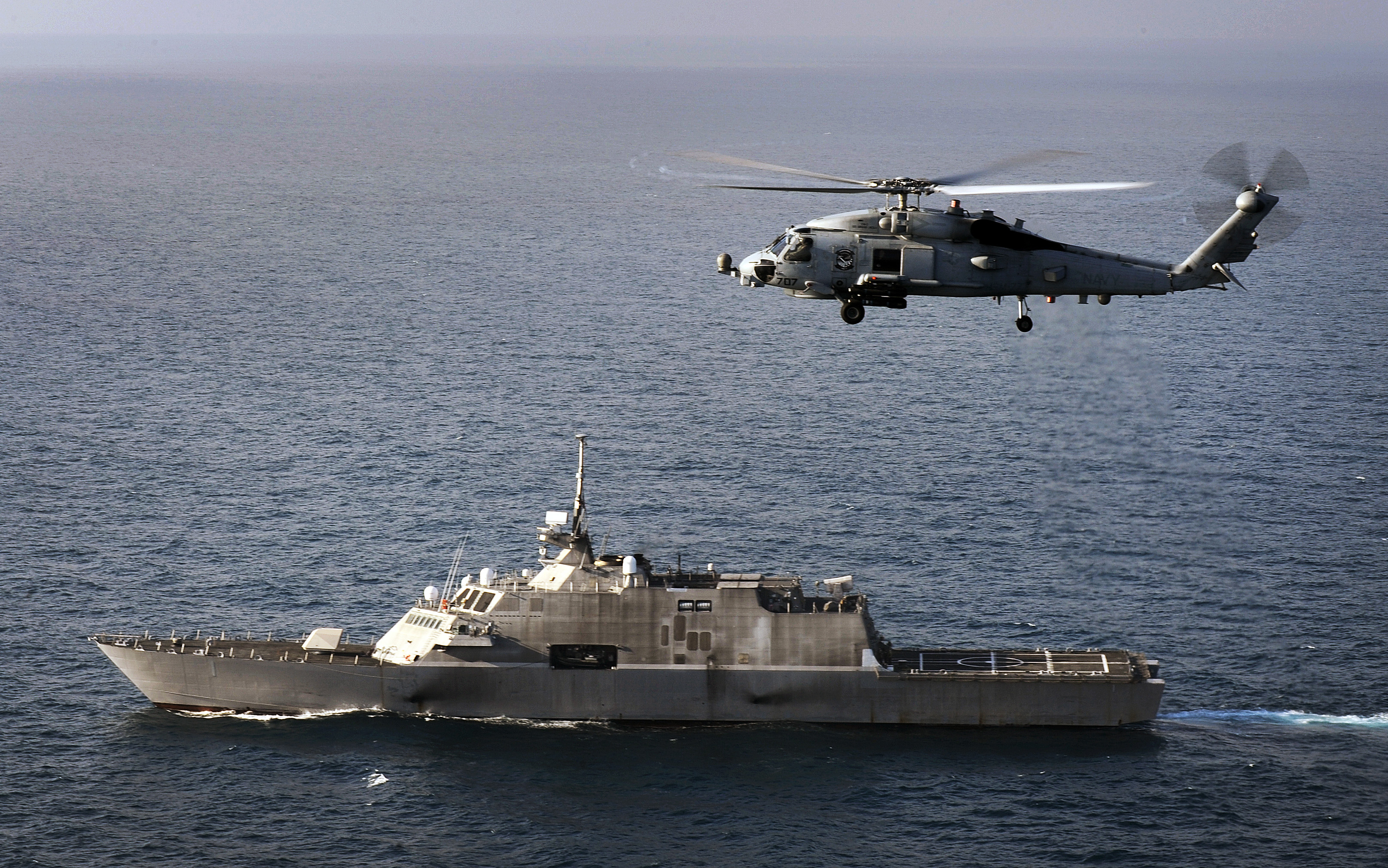 US_Navy_110607-N-DB113-207_An_MH-60R_Sea_Hawk_helicopter_assigned_to_Helicopter_Maritime_Strike_Squadron_%28HSM%29_77_flies_alongside_the_littoral_comb.jpg