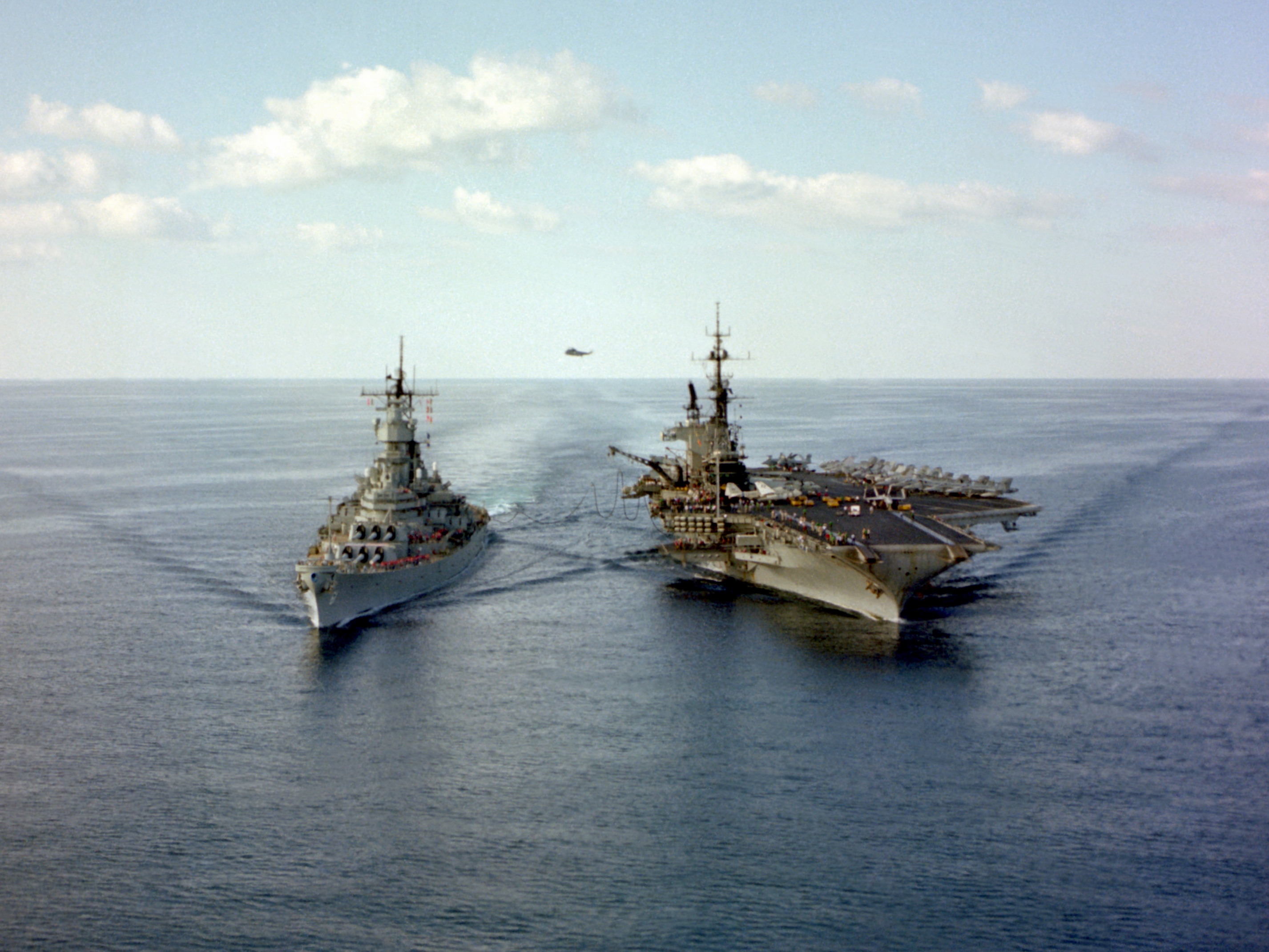USS_Iowa_%28BB-61%29_alongside_USS_Midway_%28CV-41%29_in_1987.JPEG