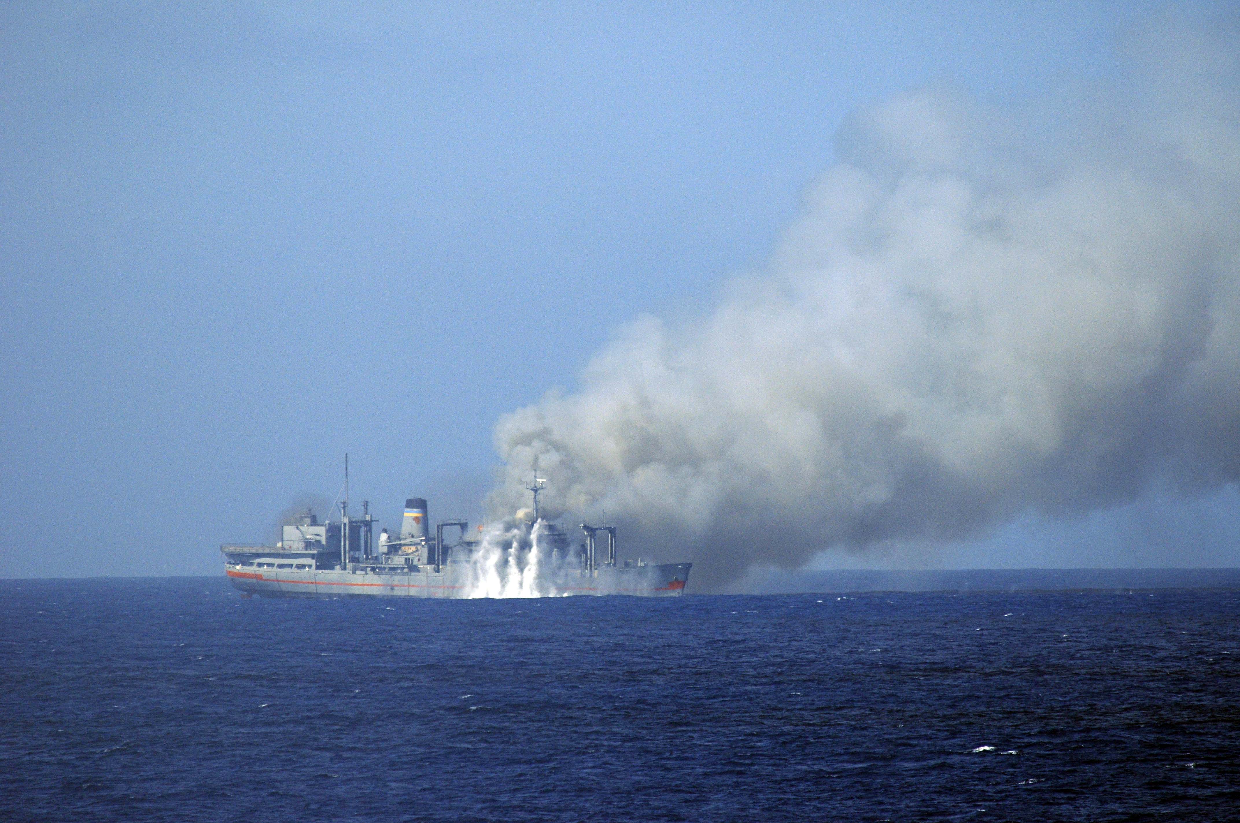 US_Navy_101027-N-8913A-252_Rounds_from_a_Mk-15_Phalanx_Close-in_Weapon_System_%28CIWS%29_from_the_guided-missile_destroyer_USS_Mitscher_%28DDG_57%29_impact.jpg